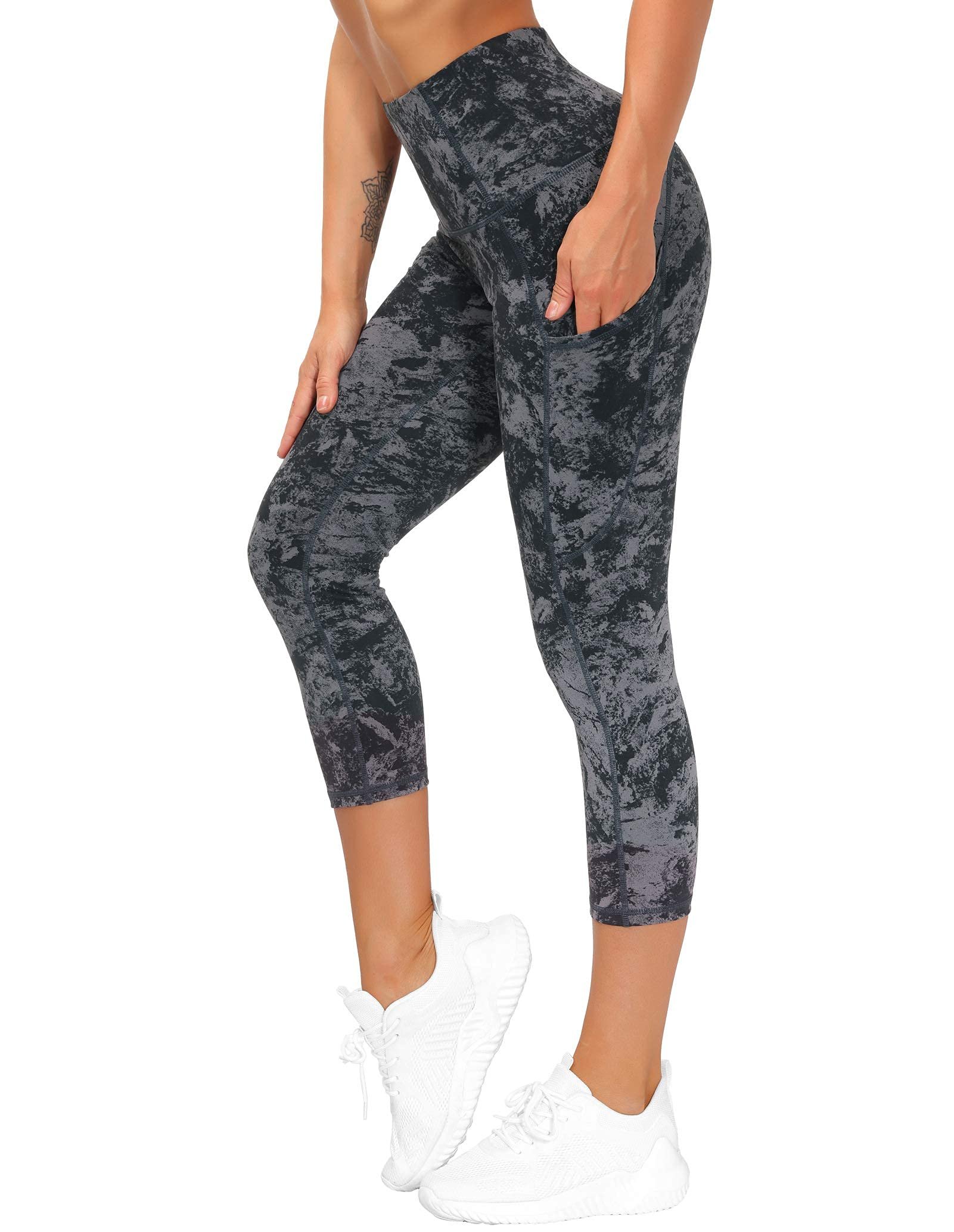 Marble capris showing the curved side pocket seam — The Gym People Women's Thick High Waist Capris Yoga Pants Workout Leggings