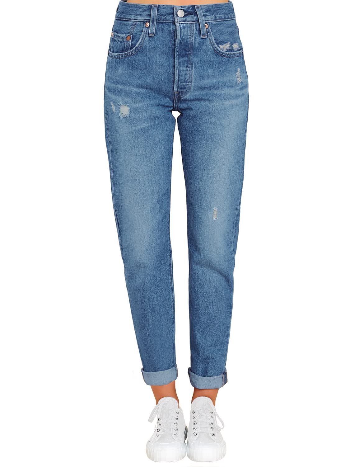 White sleeveless mock neck tucked into high-waisted jeans — Luvamia Women's Casual High Waist Stretch Relaxed Fit Classic Tapered Jeans Mom Blue Size