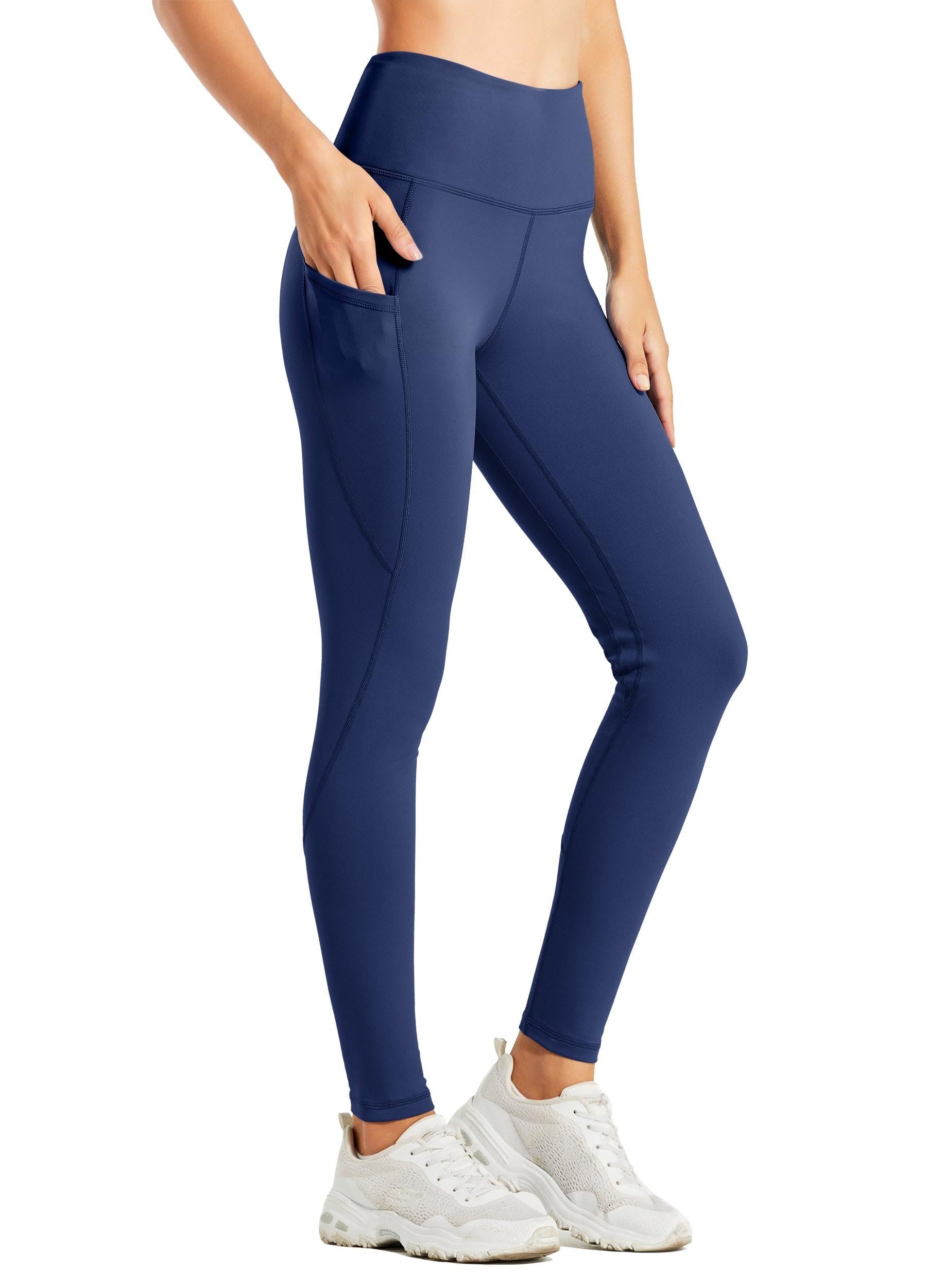 Curved stitching outlines the thigh pockets on navy leggings — Willit Women's Fleece Lined Leggings Water Resistant Winter Pants 4 Pockets