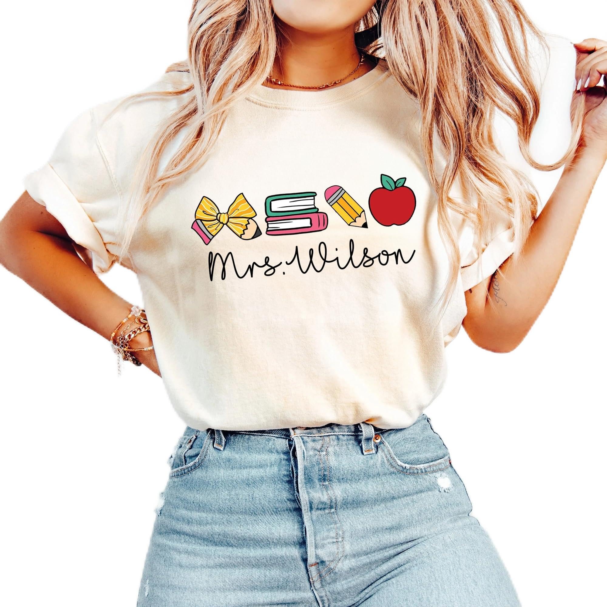 Mrs. Wilson in script under apple and pencil icons — Chillever Personalized Teacher Shirts, Custom Teacher Name Outfits for Women, Teachers Appreciation Gifts