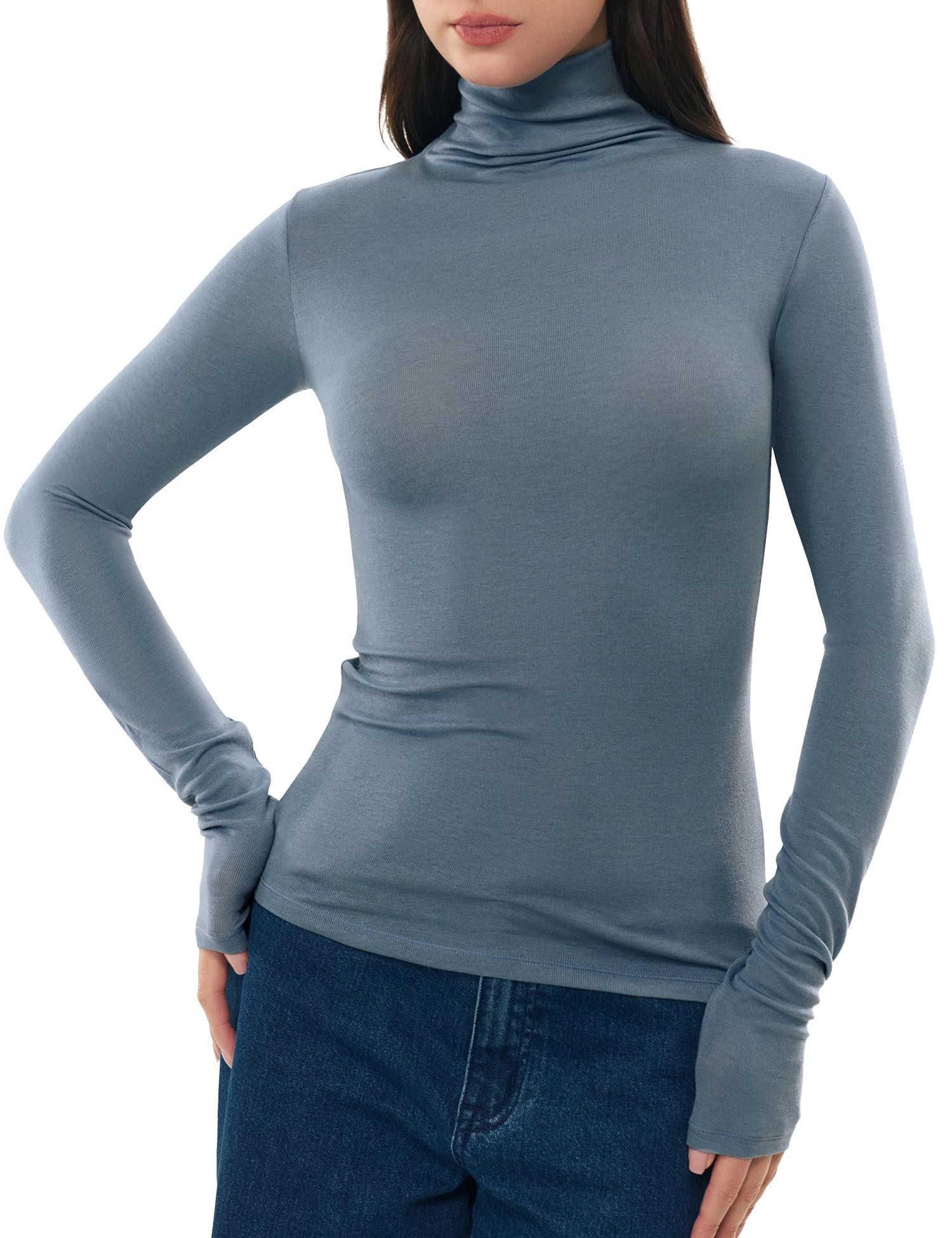 Dusty blue turtleneck tucked into high-waisted black pants — C202 Merino Wool Blend Turtleneck Tops Long Sleeve Shirts Fitted Basic Tee
