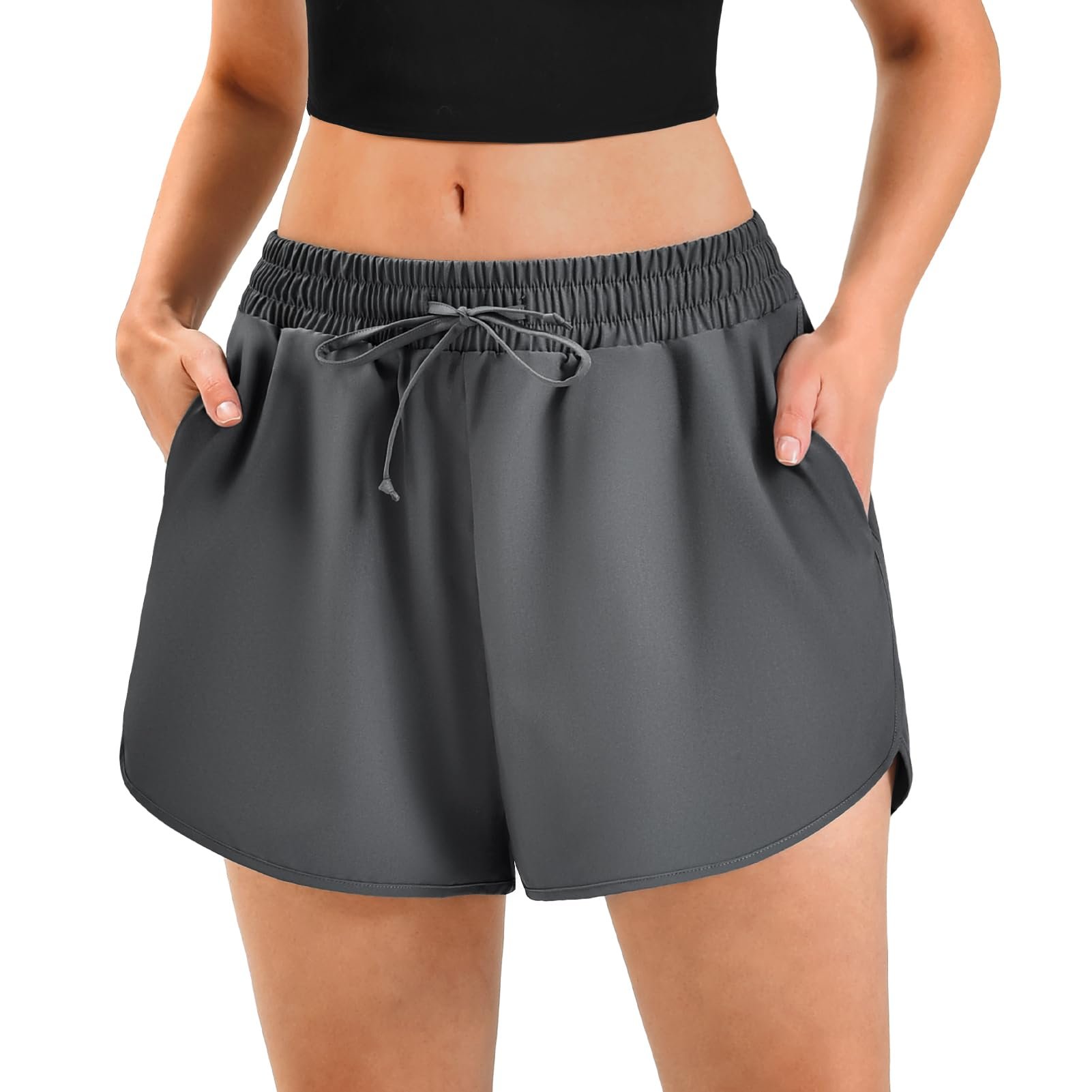 Oversized olive knit falling over charcoal shorts — Ipletix Women's Athletic Running Shorts with Pockets 2.5